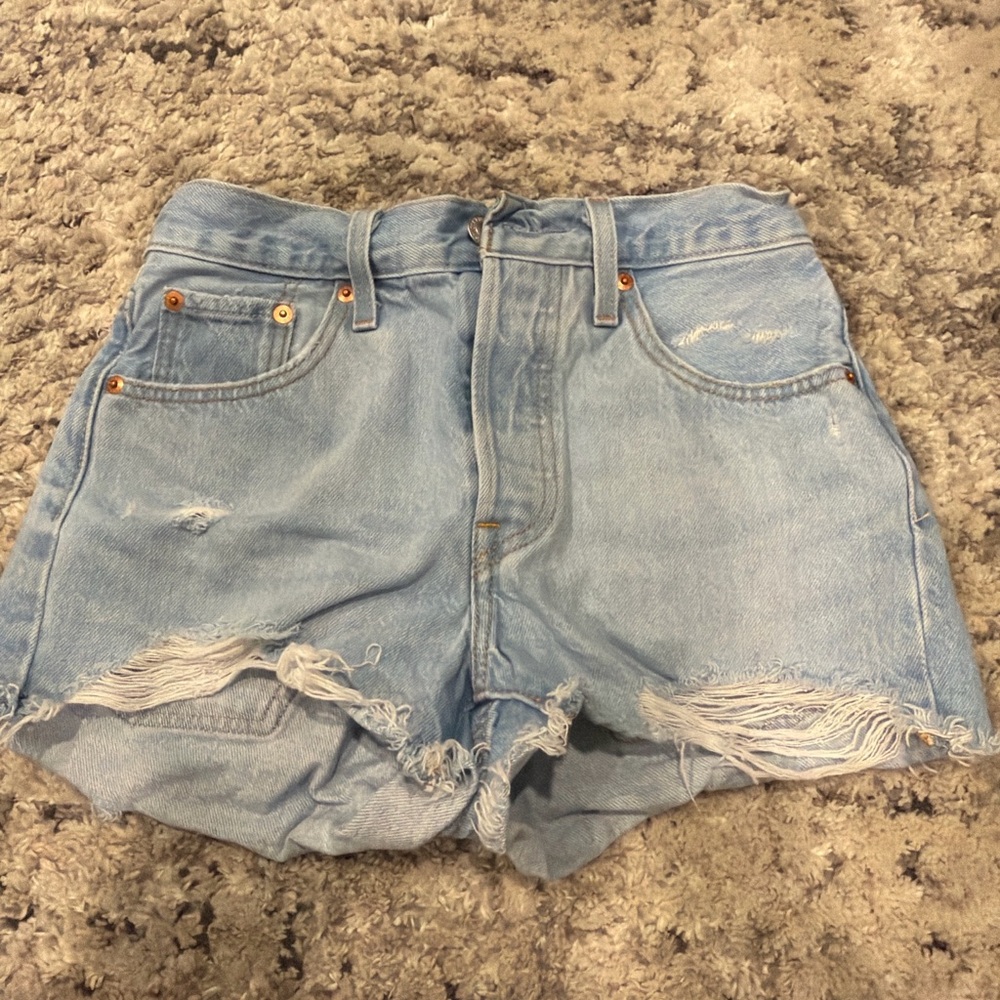 Levi’s 501 Light Blue Distressed Denim Shorts